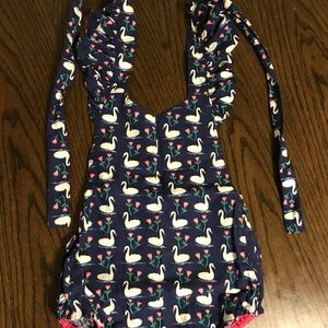 Handmade romper done by petals and pixie dust